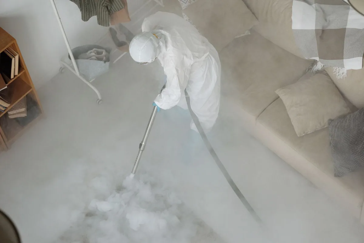 Biohazard cleanup technician in protective equipment, Bellevue, WI